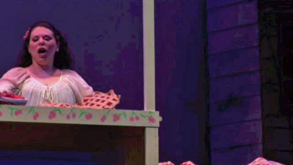 Marie sets up her Cherry booth